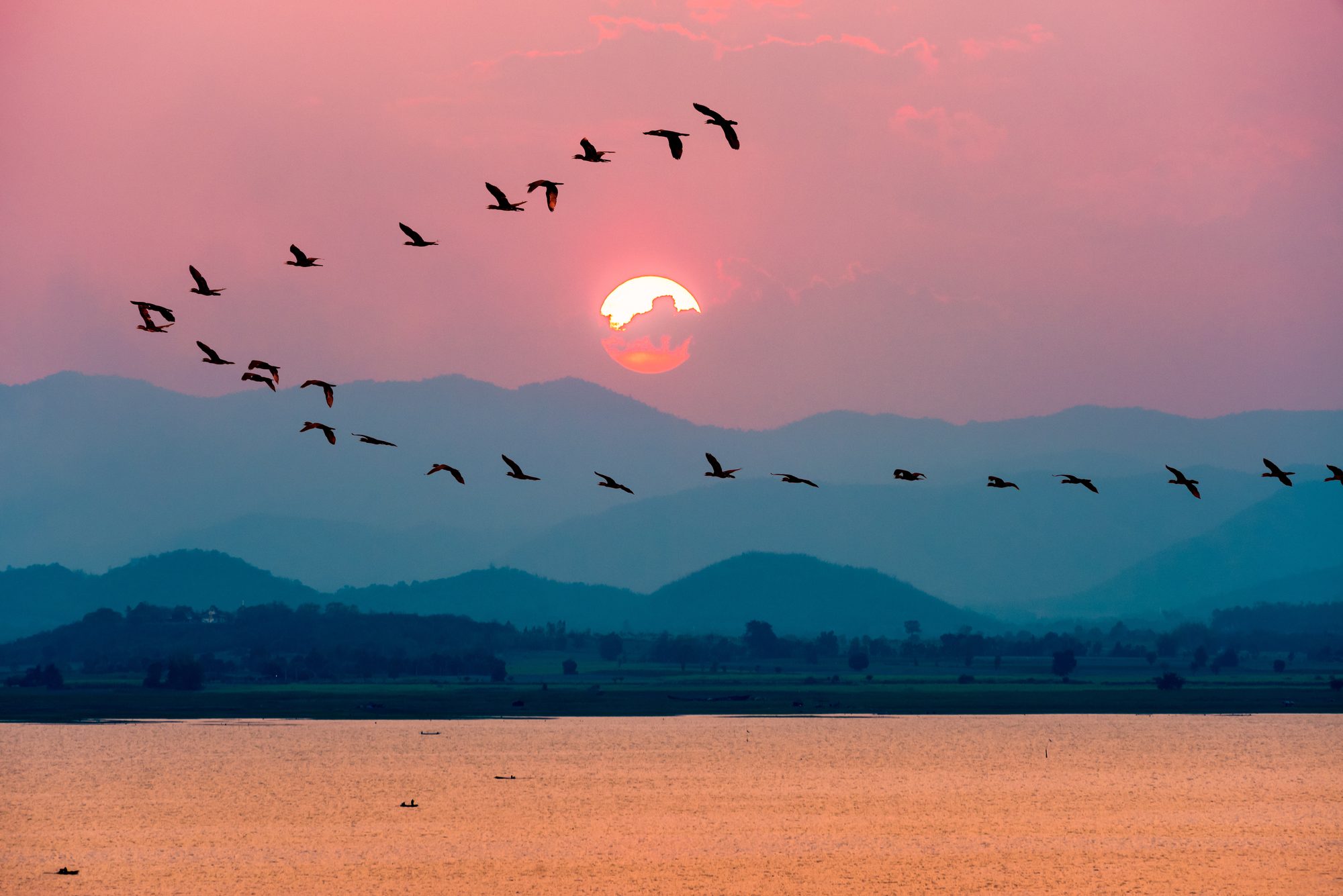 Kra Siao Dam scenic reservoir and sunset landscape in Suphanburi